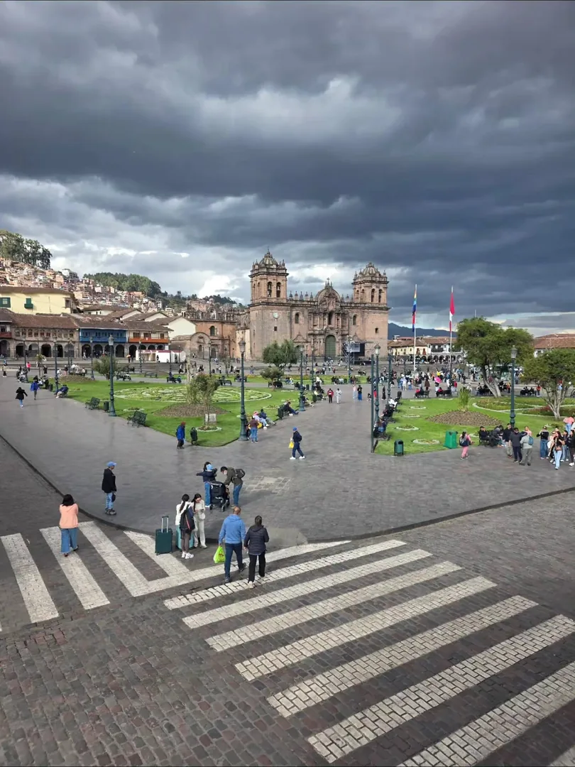 Travelers exploring historic Cusco